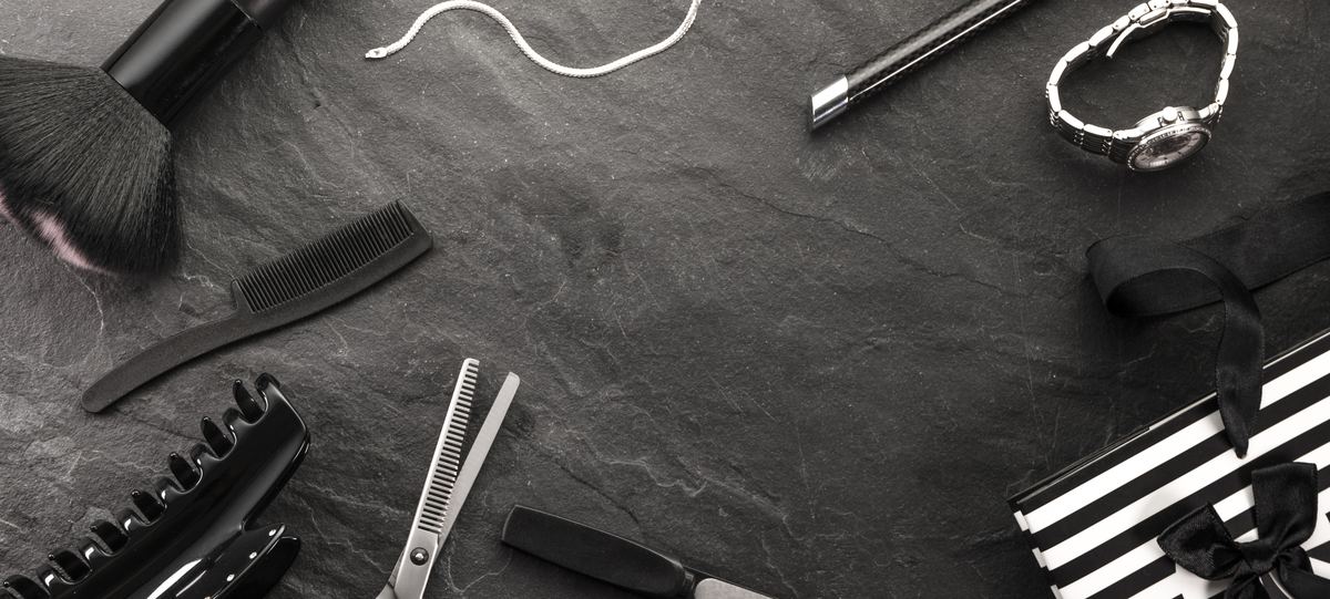 Black and white styling tools laid out at Bowie Beauty